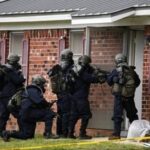 Armed Agents Entering House2